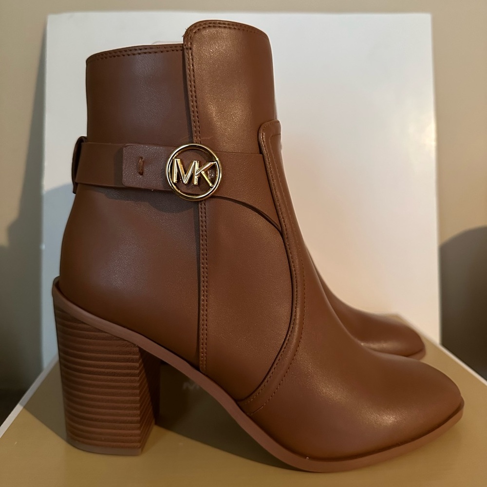 Carmen leather heeled booties. Michael Kors brand new. Never worn. Size 9